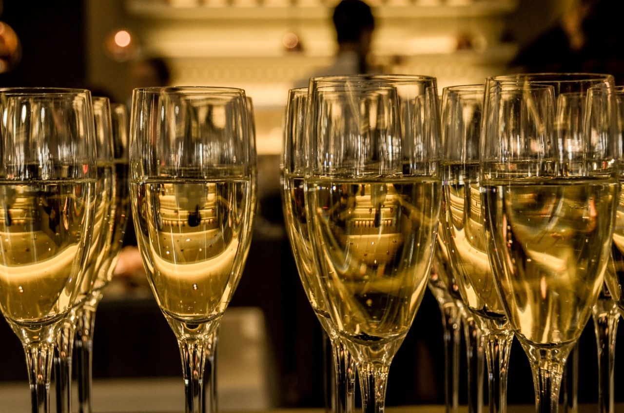 New Year's celebration with sparkling wine in champagne flutes