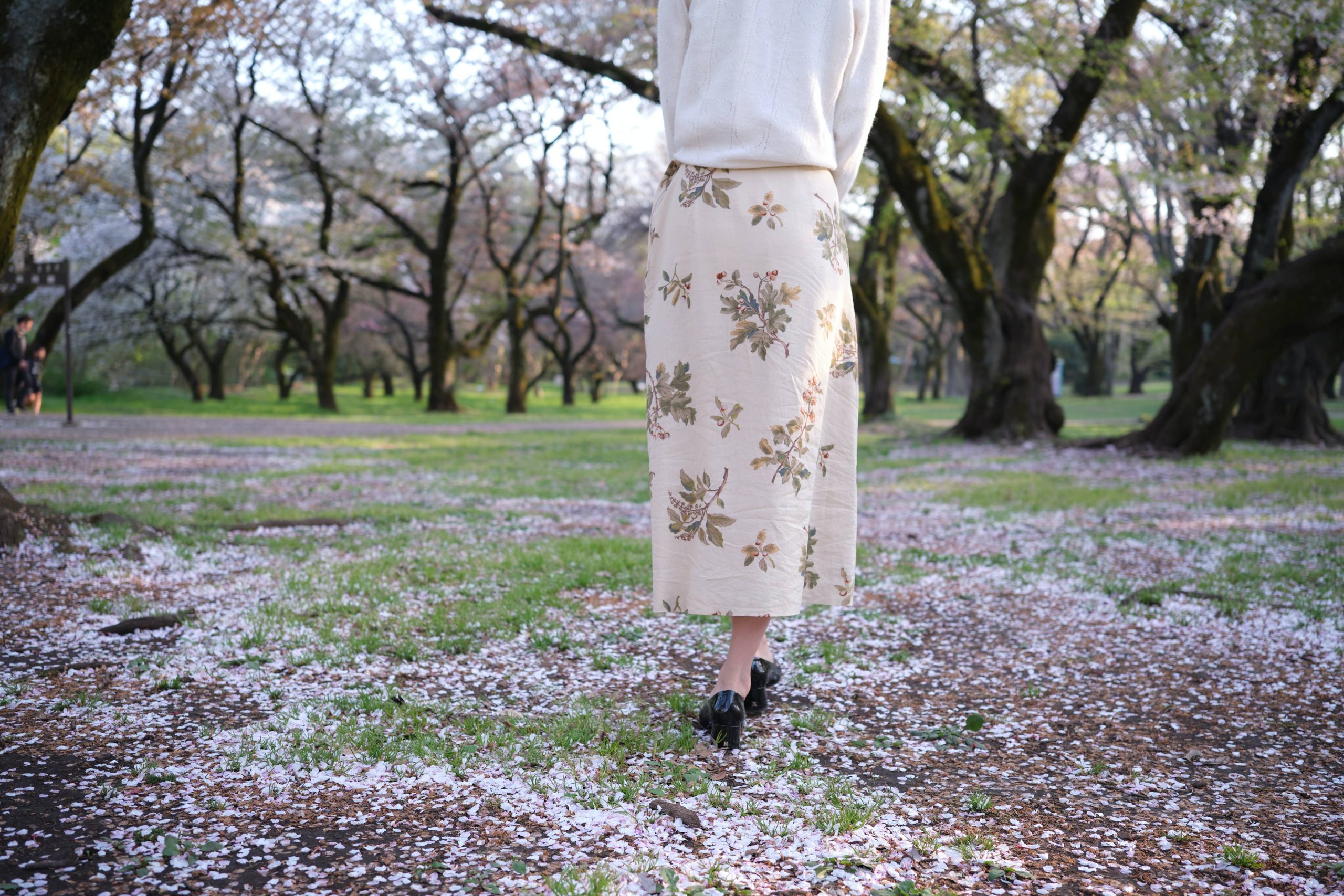 Woman walking in forest