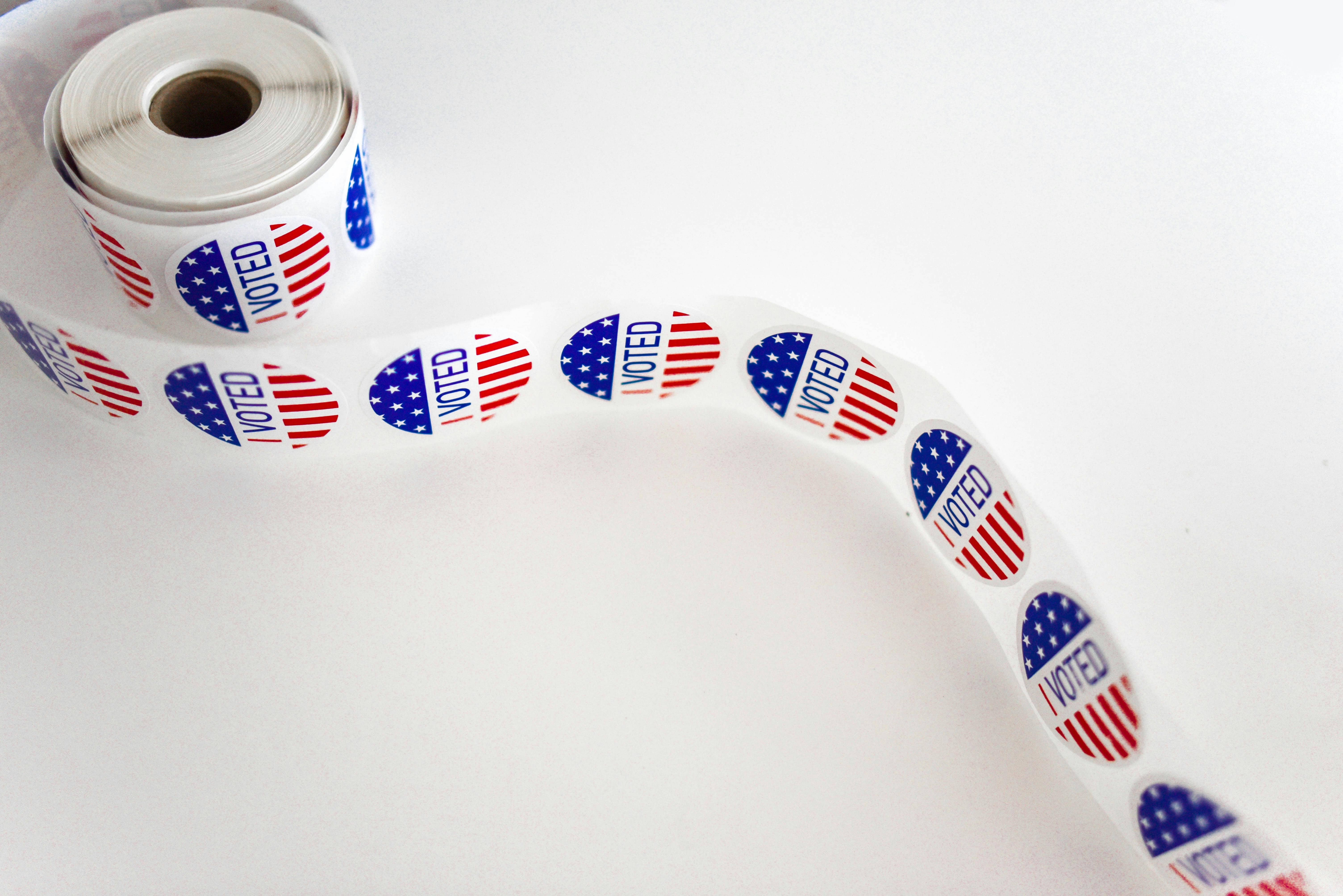 Roll of vote pictures on table to represent election anxiety in Nashville